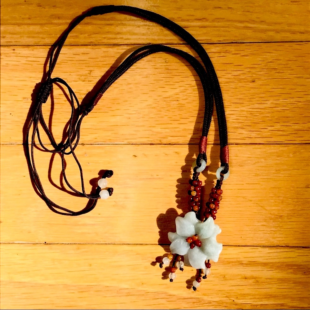 Jade necklace, handmade in Maui. Cinch cord in back.